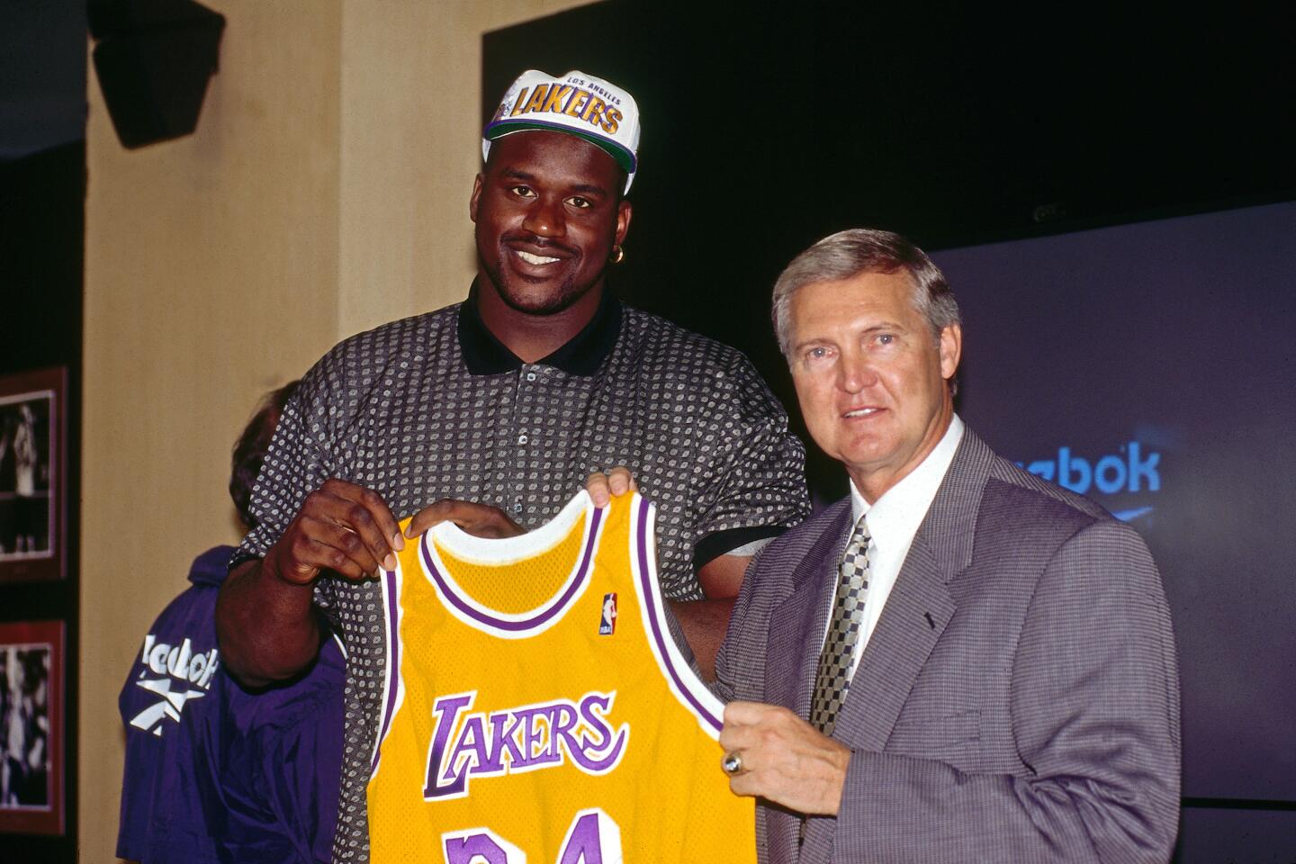 Shaquille O'Neal poses with Jerry West after signing with the Lakers on July 19, 1996, at the Forum.