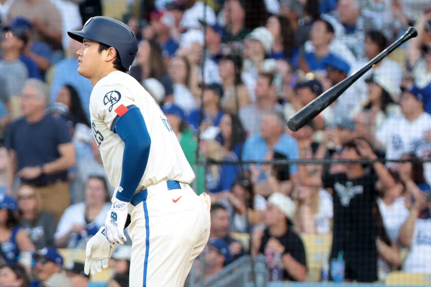 LOS ANGELES, CALIFORNIA-Dodgers Shohei Ohtani hits a two-run home run against the Angels.
