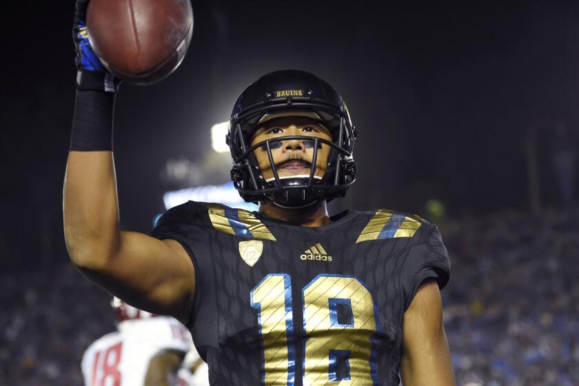 UCLA wide receiver Thomas Duarte celebrates after making a catch against Washington State in November.
