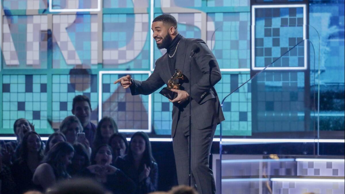 Rapper Drake accepts the award for Best Rap Song for 'God's Plan'at the 61st Grammy Awards.