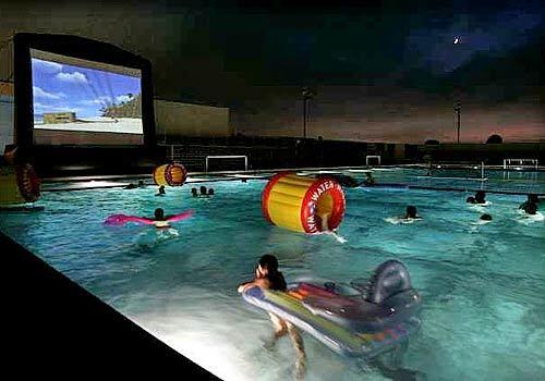 Moviegoers enjoy a showing of "Madagascar" in the Corona del Mar High School pool, put on by Newport Beach's recreation department and billed as "dive-in movie night." The movie's tropical setting is coincidentally being reflected in Southland ocean temperatures, which have risen into the mid-70s and higher because of abnormal wind conditions.