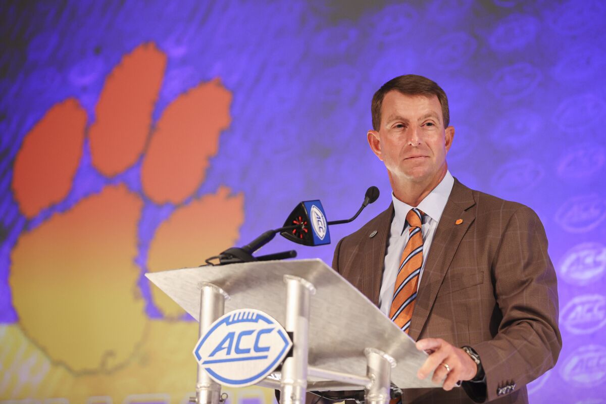 Clemson head coach Dabo Swinney listens to a question during an NCAA college football news conference at the Atlantic Coast Conference media days in Charlotte, N.C., Thursday, July 22, 2021. (AP Photo/Nell Redmond)