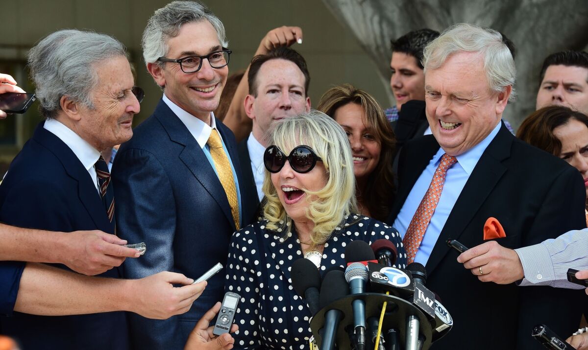 A happy Shelly Sterling speaks to the media Monday outside court in Los Angeles after a ruling favoring her deal to sell the Clippers to Steve Ballmer.