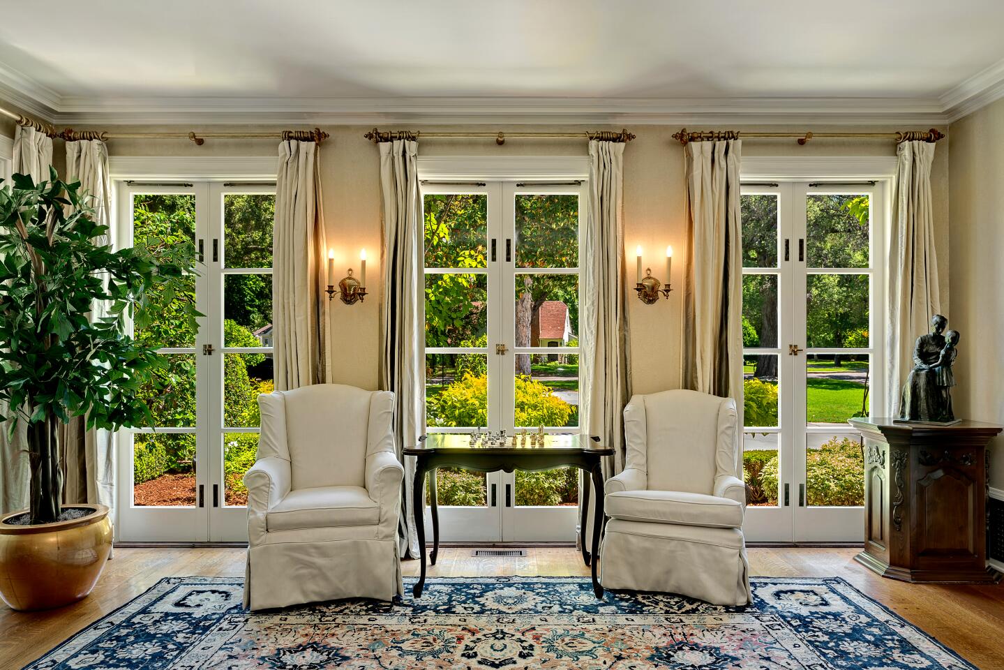 The four-bedroom, five-bathroom Colonial retains an aura of gracious living.