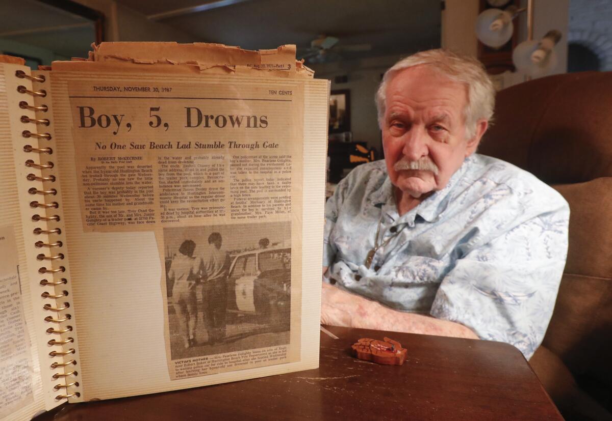 Bob Baker shows the newspaper story he saved from an incident he was involved with.