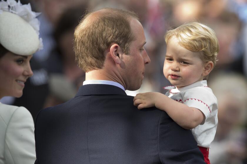 What a special day! Cameras catch a glimpse of Prince George and his parents, Prince William and Catherine, Duchess of Cambridge, after his sister Princess Charlotte's Christening at St. Mary Magdalene Church in Sandringham, England.