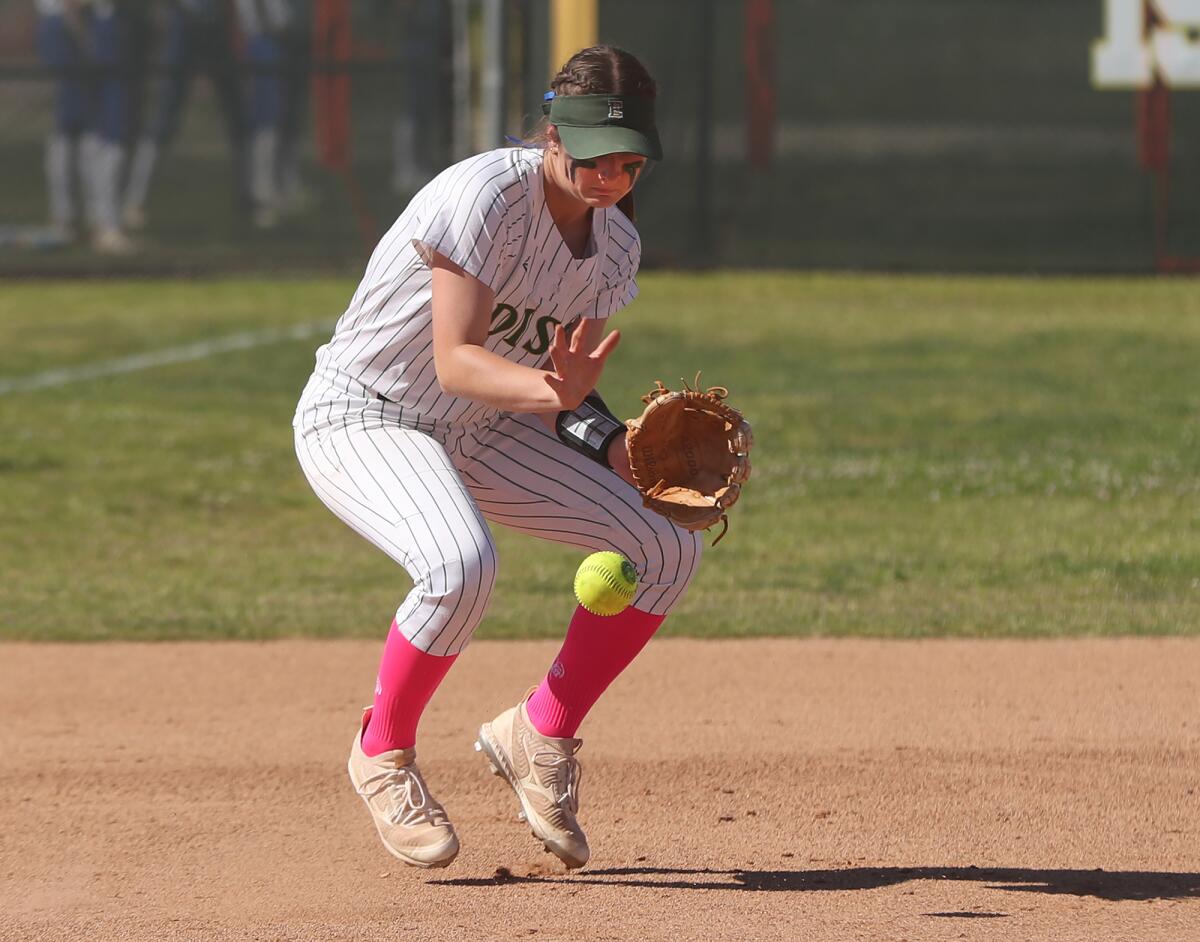Edison's Sophia Hannappel (41) stops a hard ground ball to third against Fountain Valley on Tuesday.