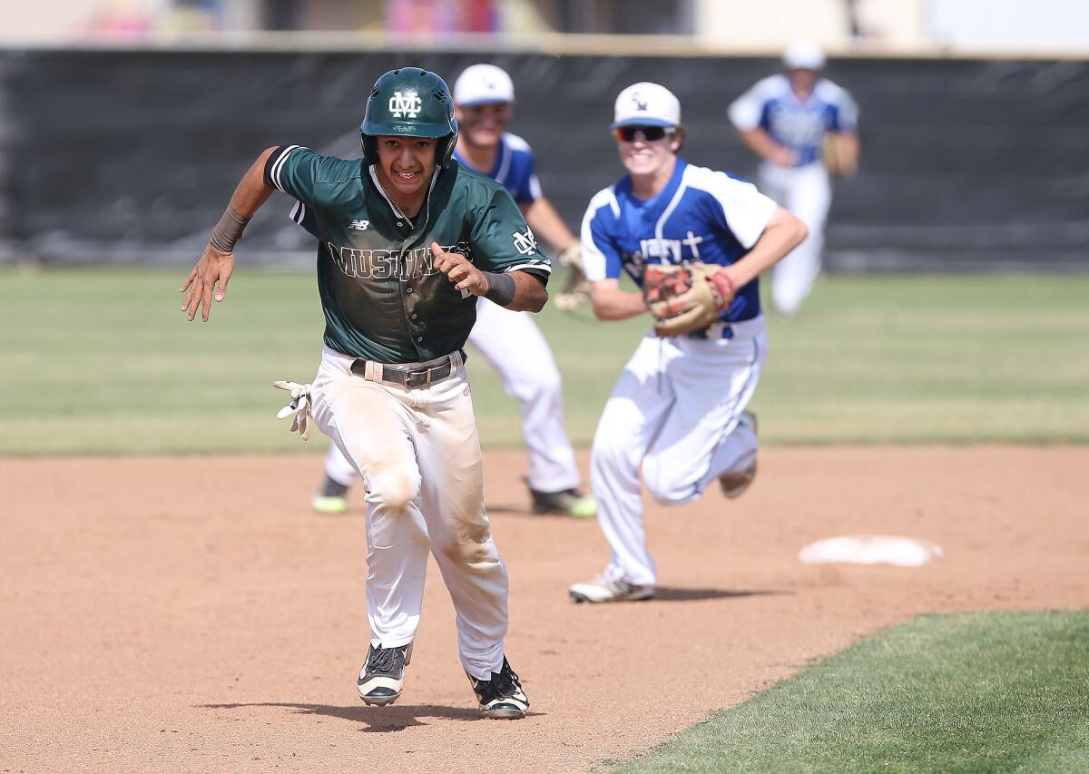 Costa Mesa's Miguel Rodriguez is on the run in the semifinals of the CIF Southern Section Division 6 playoffs against Calvary Murrieta at home on May 14.