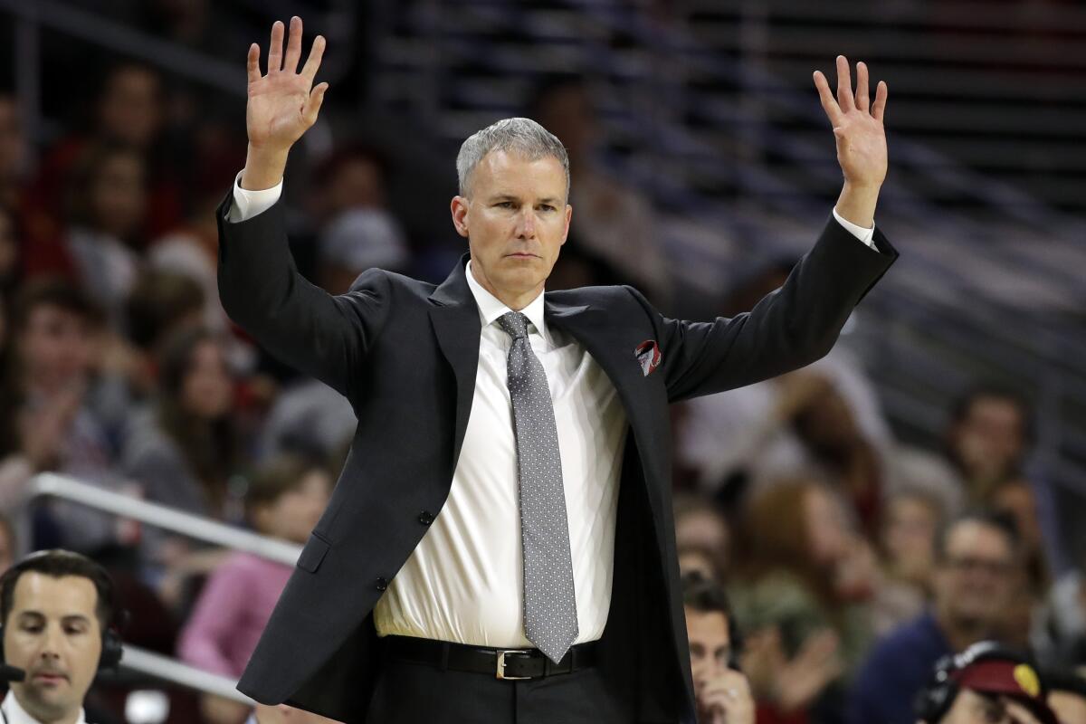 USC coach Andy Enfield gestures during a game.