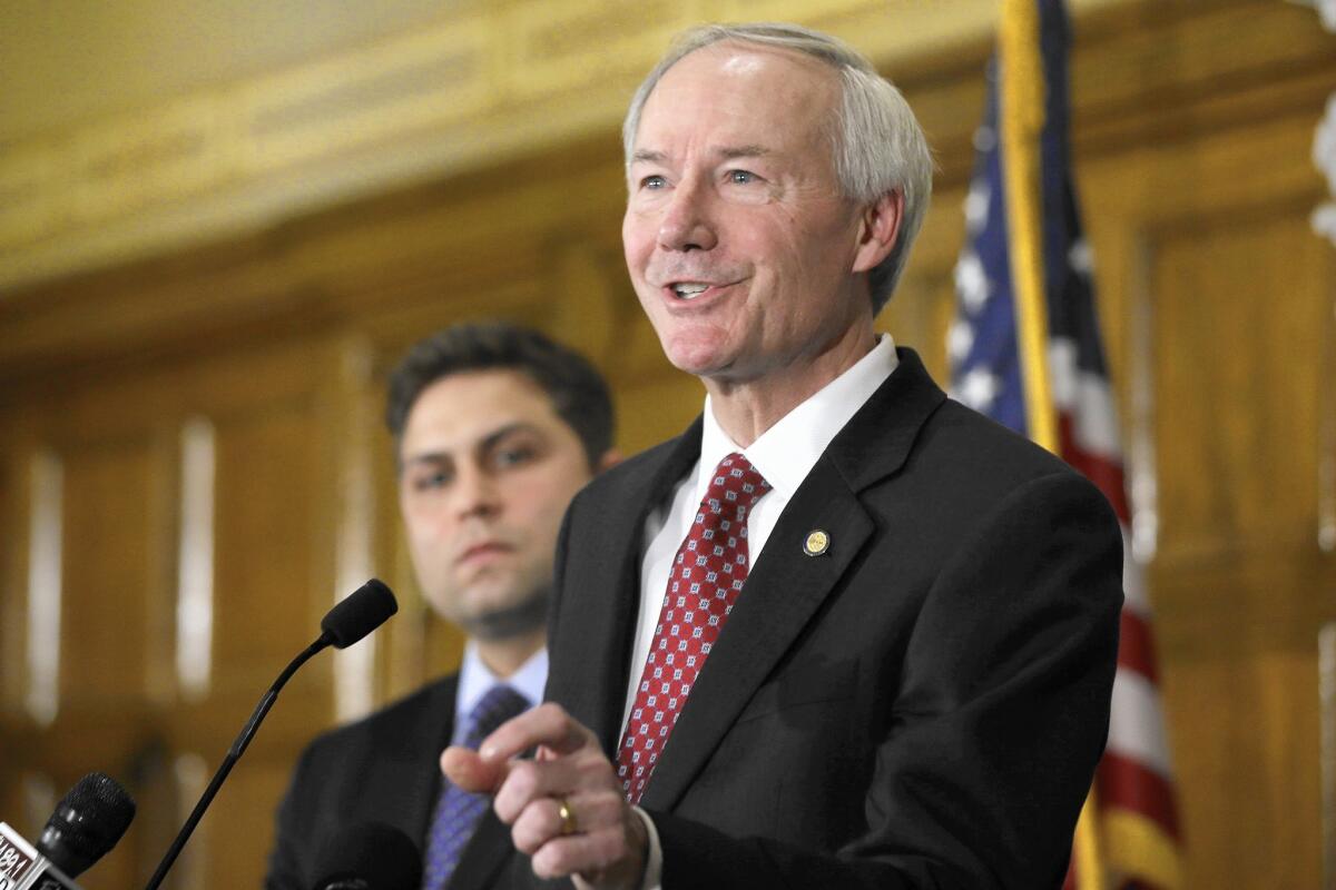 Leading companies including Wal-Mart have called upon Arkansas Gov. Asa Hutchinson to veto a religious freedom bill that many believe would sanction discrimination based on sexual orientation.