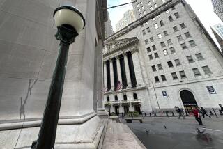 FILE - The New York Stock Exchange, at rear, is shown on Sept. 24, 2024, in New York. (AP Photo/Peter Morgan, File)