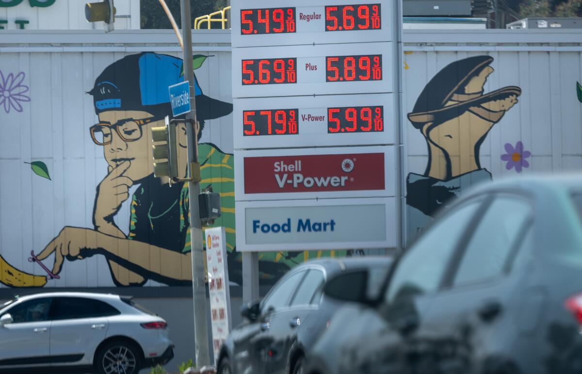 Gas prices are displayed on a sign in Studio City.
