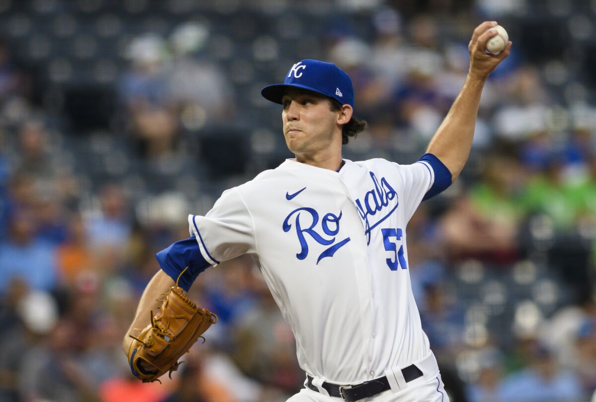 Kansas City Royals starting pitcher Daniel Lynch throws to a Houston Astros batter during the first inning of a baseball game Tuesday, Aug. 17, 2021, in Kansas City, Mo. (AP Photo/Reed Hoffmann)