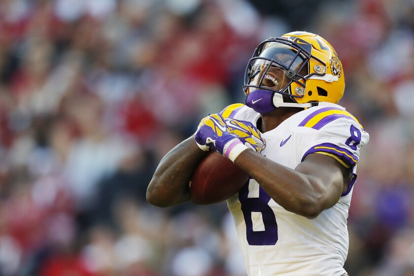 LSU's Patrick Queen celebrates after intercepting a pass during the second quarter against Alabama on Nov. 9 