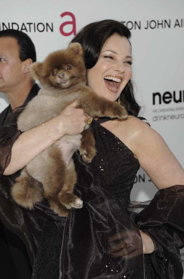 Actress Fran Drescher accessorized with her pooch.