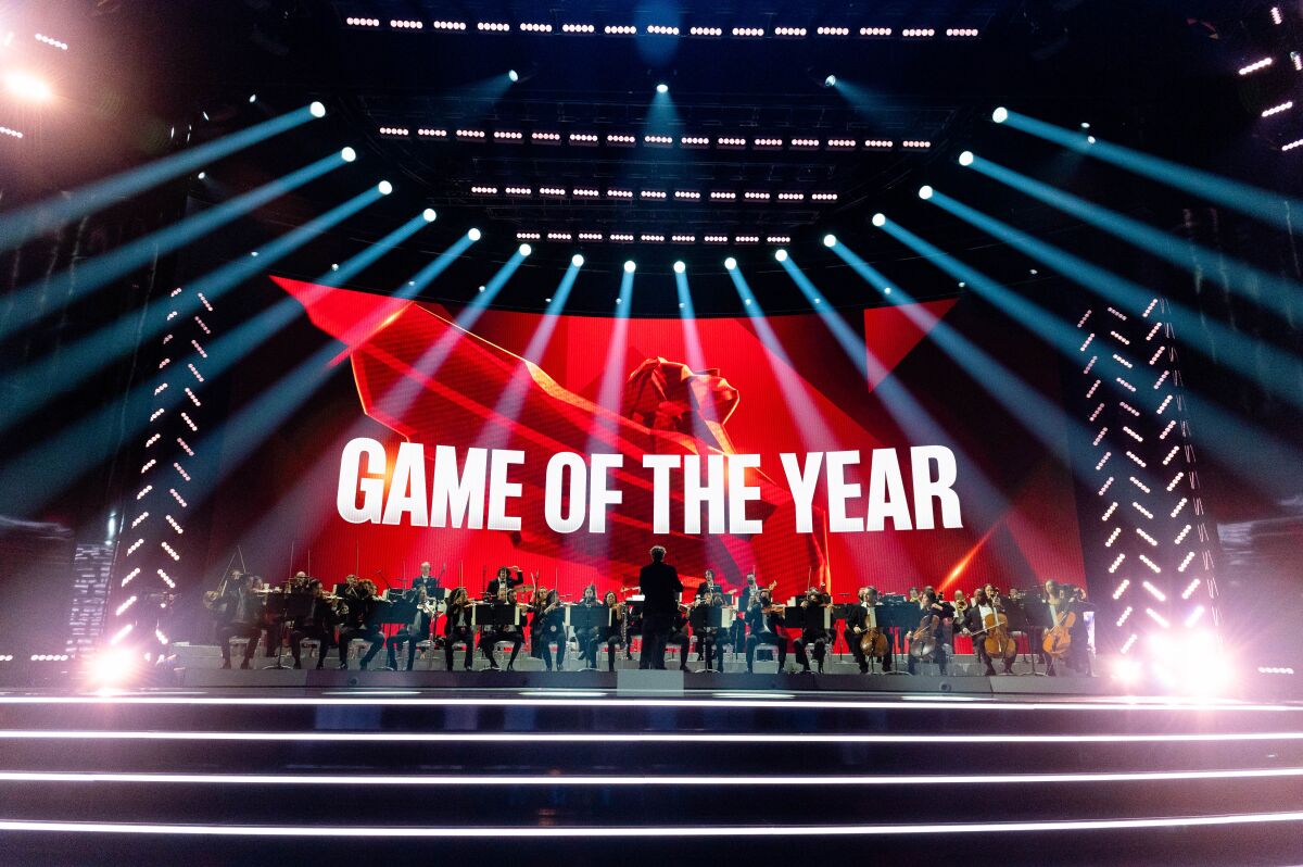 Composer Lorne Balfe conducting an orchestra at the 2022 Game Awards, held in downtown Los Angeles.