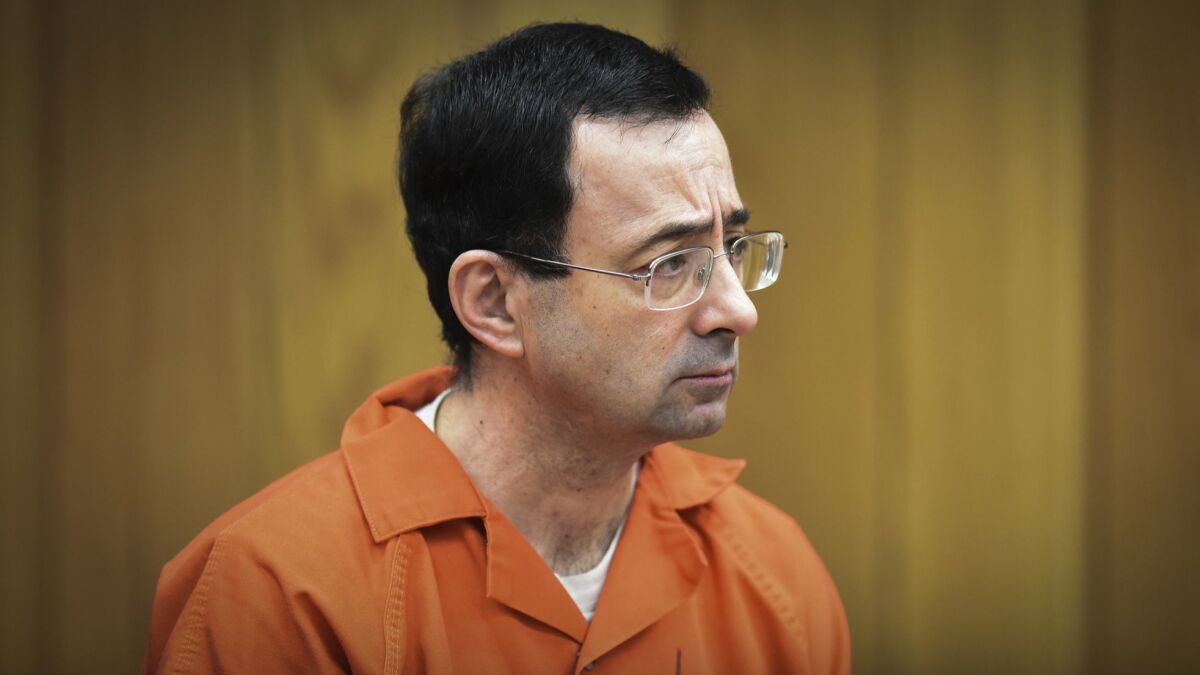 Michigan State University reached a $500-million settlement this year with victims of sports doctor Larry Nassar, above.