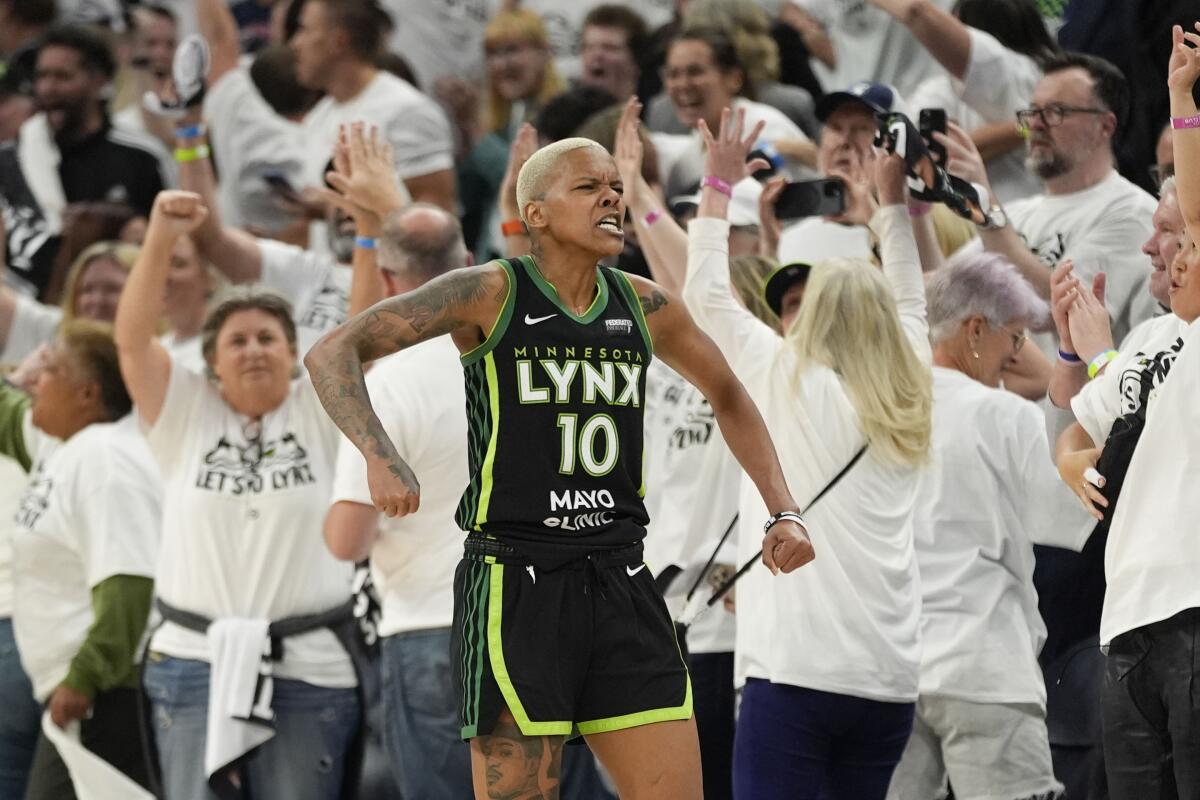 Minnesota Lynx guard Courtney Williams celebrates after an 82-80 victory over the New York Liberty in Game 4.