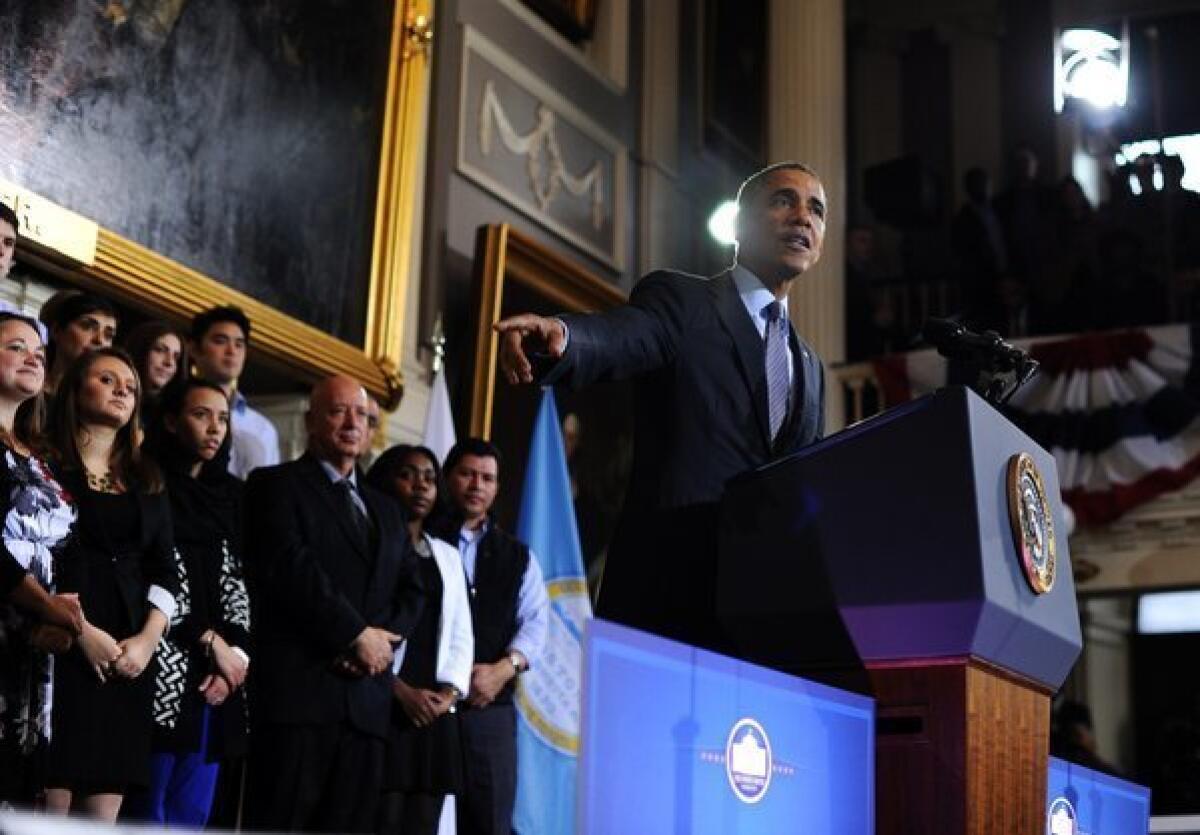 President Obama speaks on healthcare before a crowd of supporters at Faneuil Hall in Boston on Wednesday.
