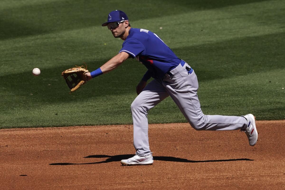 Los Angeles Dodgers' Trea Turner (6) fields against the Colorado Rockies 