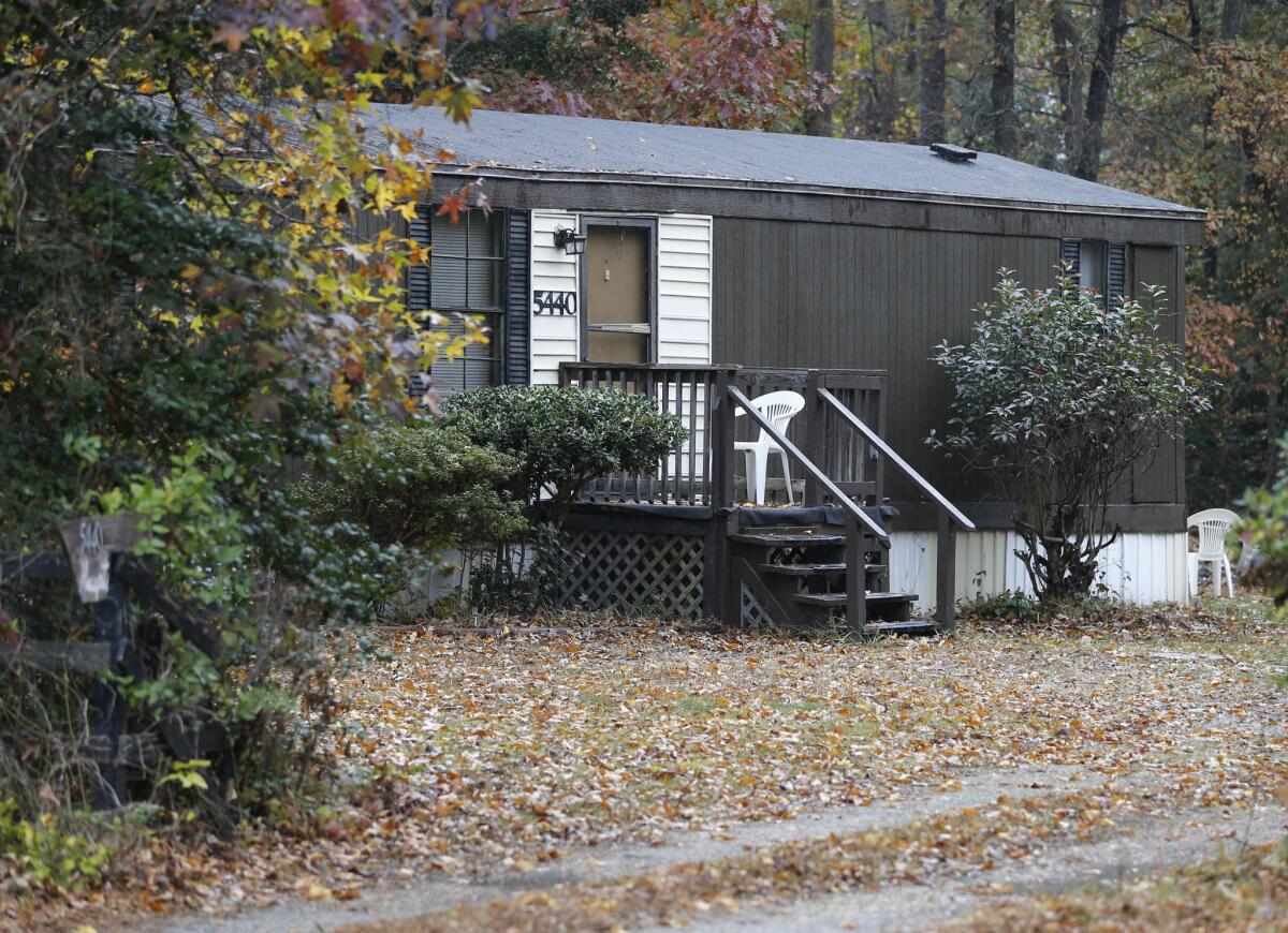 Delvin Barnes' home in Charles City, Va., sits unoccupied Thursday. Police arrested Barnes, 37, on charges that he abducted and tried to kill a Virginia girl, 16. A GPS device installed on his car led police to capture him in a case involving an abduction in Philadelphia.