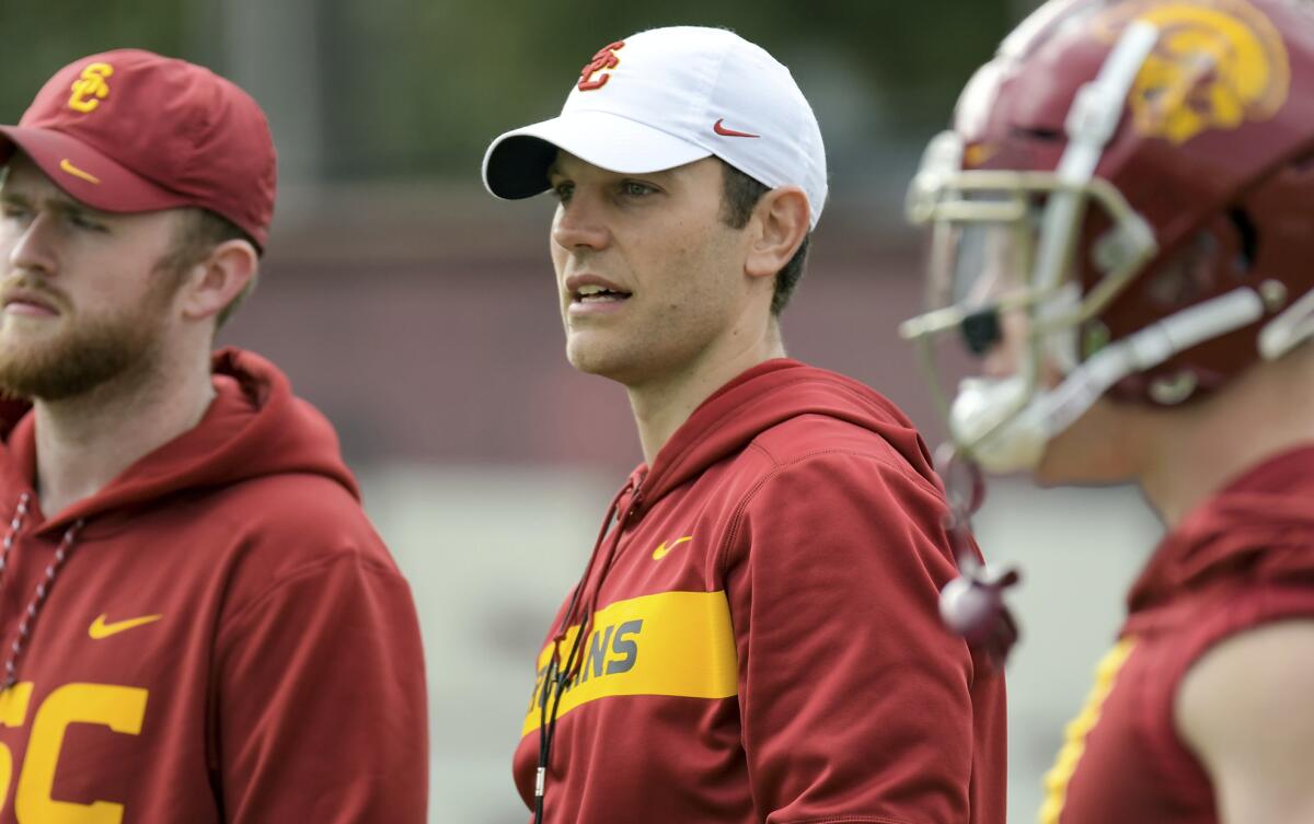 USC offensive coordinator Graham Harrell looks on during a team practice in 2019.