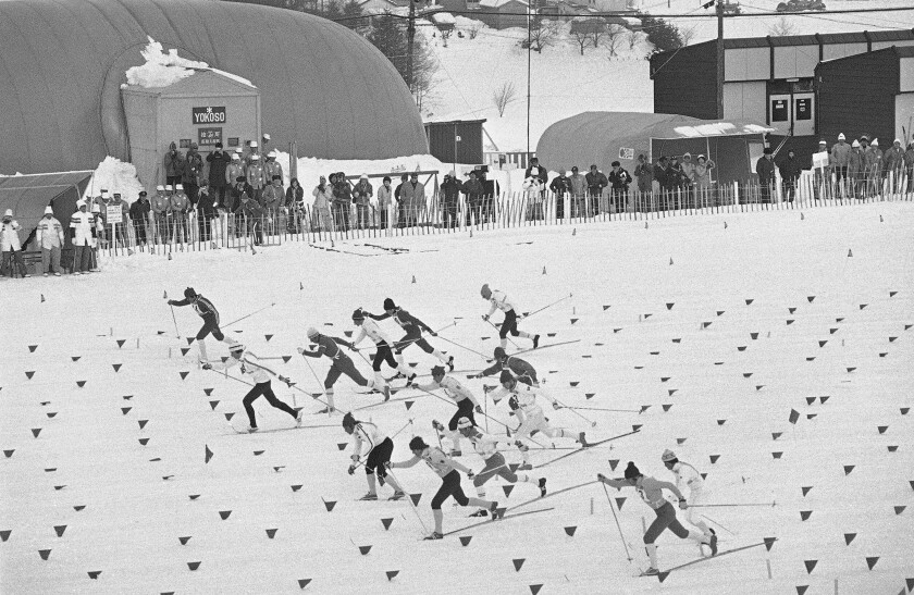 FILE - Fourteen athletes of the fourteen teams compete in the men's Olympic 4x10 kilometers cross country relay in Sapporo, Feb. 12, 1972, at the start of the race. The northern Japanese city of Sapporo is set to announce on Monday, Nov. 29, 2021, what it says will be a reduction in costs that will make it an attractive venue for the 2030 Winter Olympics. (AP Photo, File)