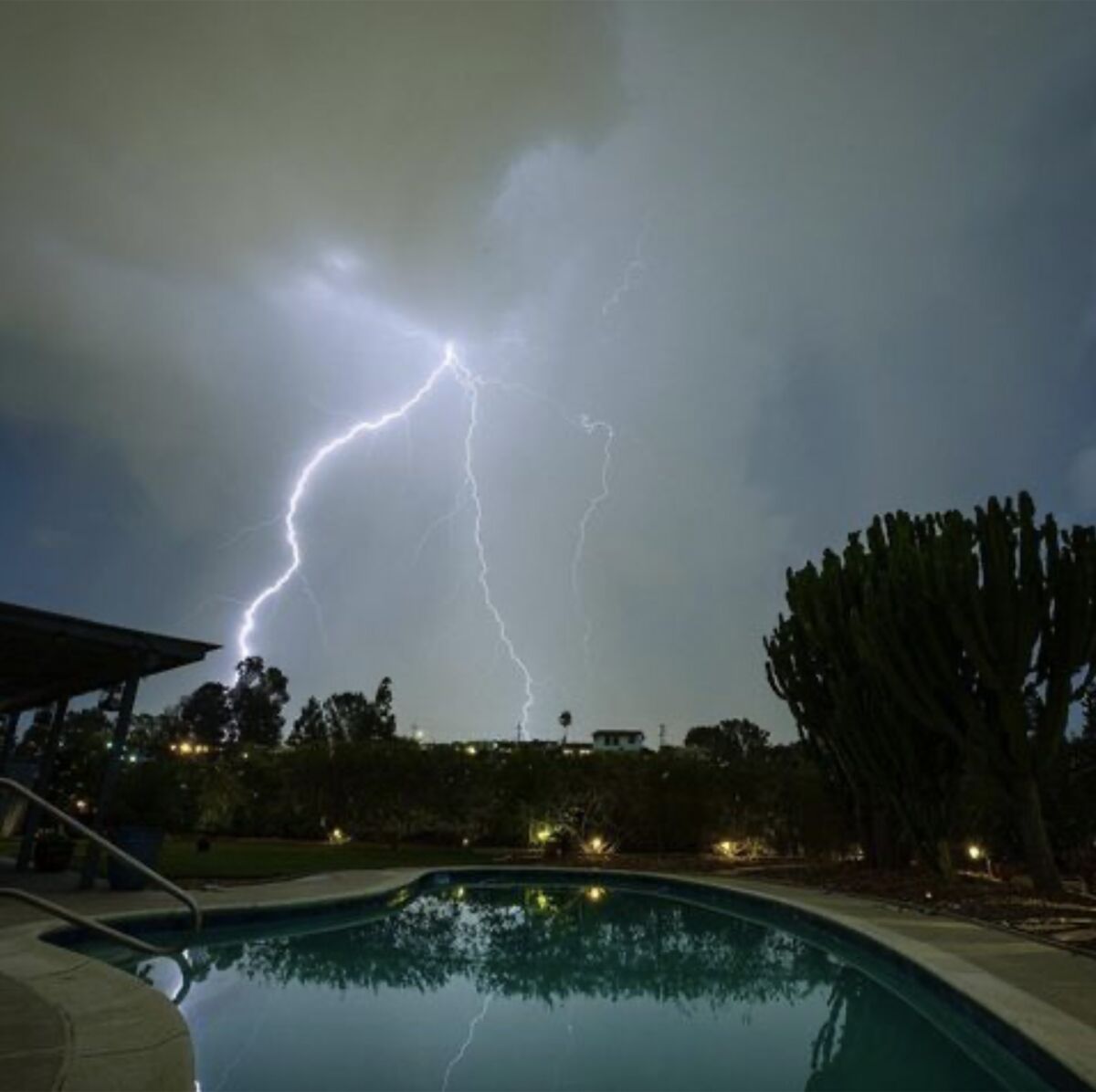 Lightning lights up the sky in a San Diego neighborhood on Thursday, September 9, 2021.