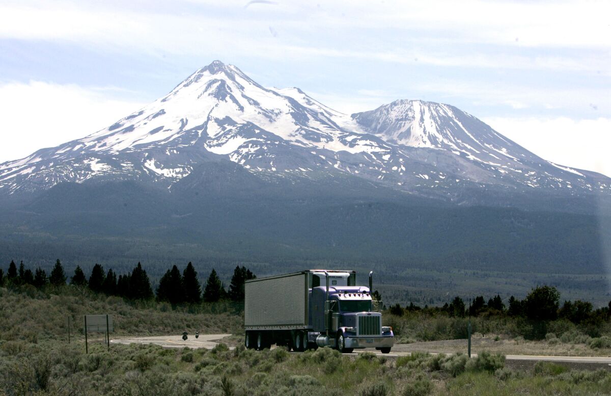 FILE -- This June 19, 2008 file photo shows Mount Shasta near Weed, Calif. Authorities say a mountain climbing guide has died and at least four other people have been injured while trying to summit California's Mount Shasta in treacherous conditions, Monday, June 6, 2022. (AP Photo/Rich Pedroncelli, File)