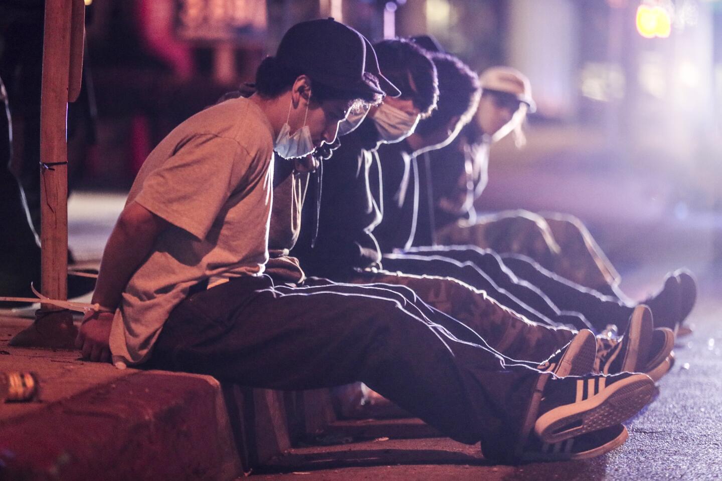 Suspected looters in custody in Santa Monica on Sunday.