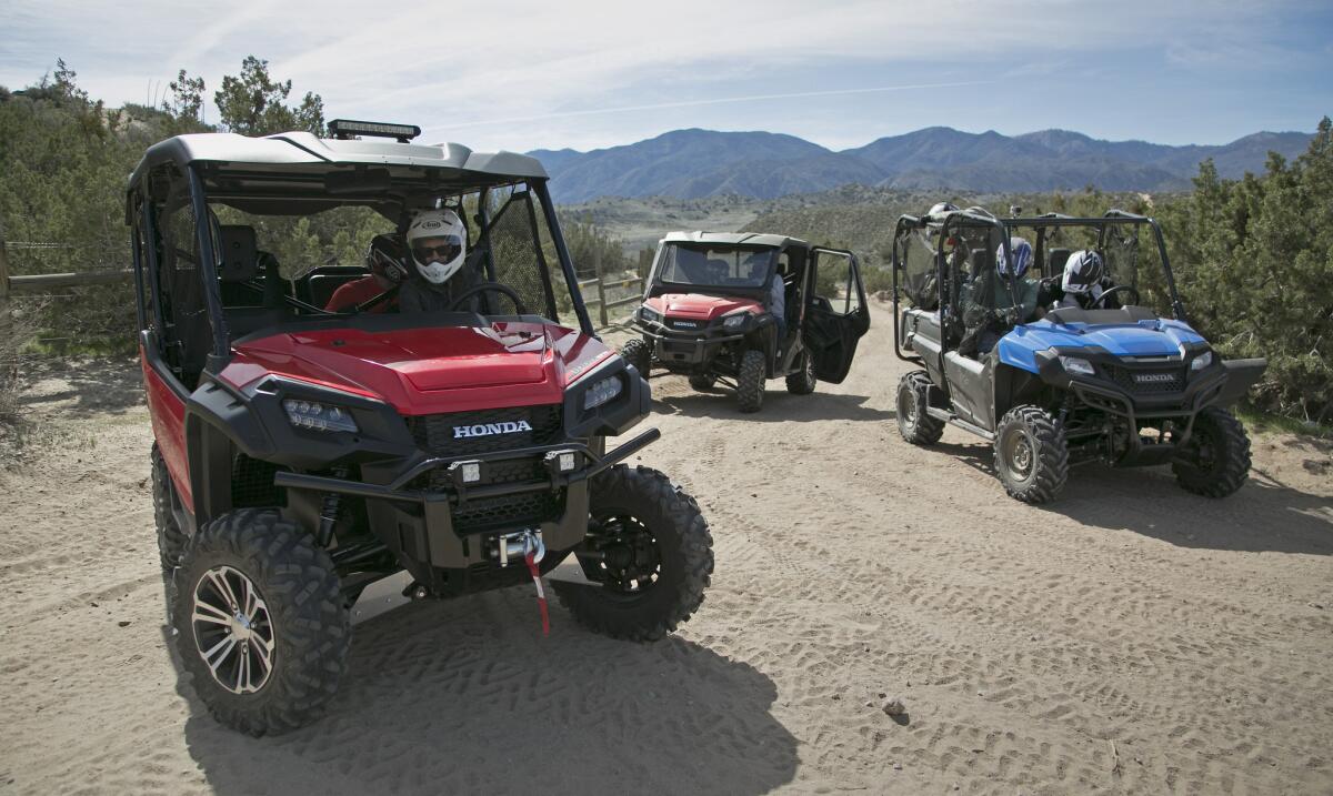 The Honda Pioneer 1000-5, left, is a five-passenger side-by-side powered by a 999cc twin-cylinder engine. Other models include the Pioneer 500, center, and the Pioneer 700-4.