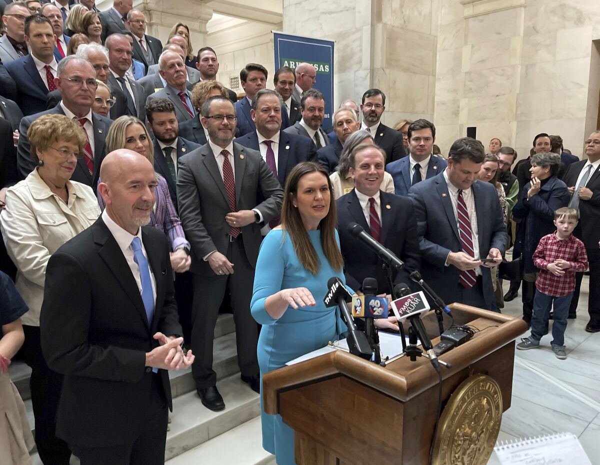Arkansas Gov. Sarah Huckabee Sanders answers reporters' questions at a news conference at the state Capitol in Little Rock, Ark., Wednesday, Feb. 8, 2023, about an education reform bill she's proposing. (AP Photo/Andrew DeMillo)