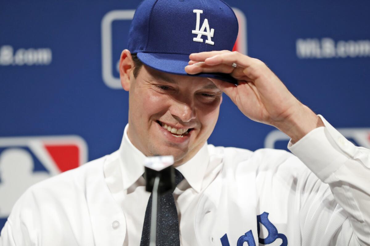 Rich Hill is back in Dodger blue.