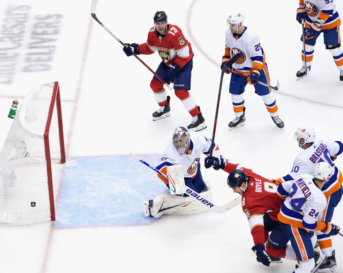 Florida Panthers' Brian Boyle scores against New York Islanders goalie Semyon Varlamov 