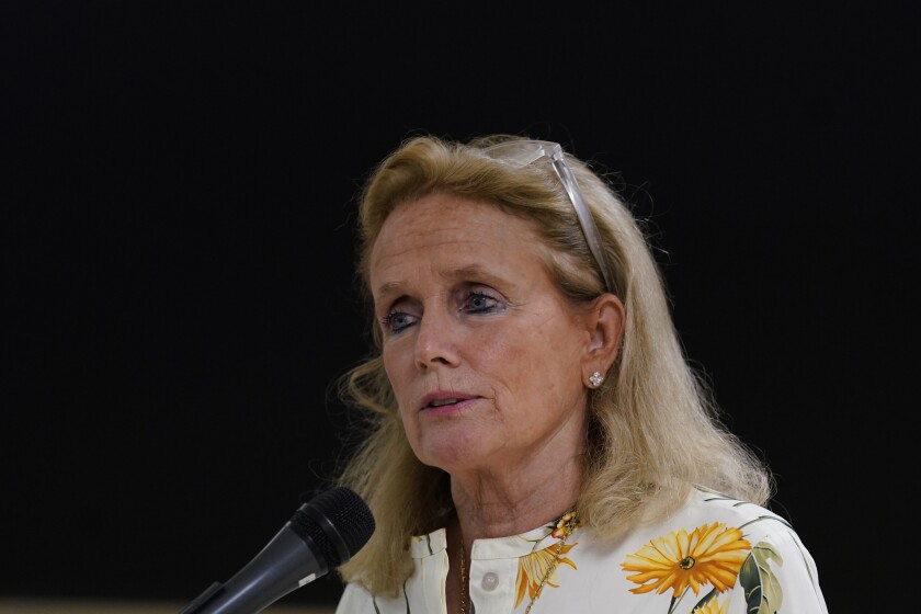 FILE - U.S. Rep. Debbie Dingell, D-Mich., addresses the media during a visit to the Water Resource Recovery Facility, July 8, 2021, in Detroit. A suburban Detroit office of Dingell's has been broken into and ransacked, with memorabilia belonging to her late husband and longtime Congressman John Dingell damaged. Dingell reported the break-in at the office in Dearborn on Monday, Nov. 29, 2021 and said it was being investigated by local and U.S. Capitol police. (AP Photo/Carlos Osorio, file)