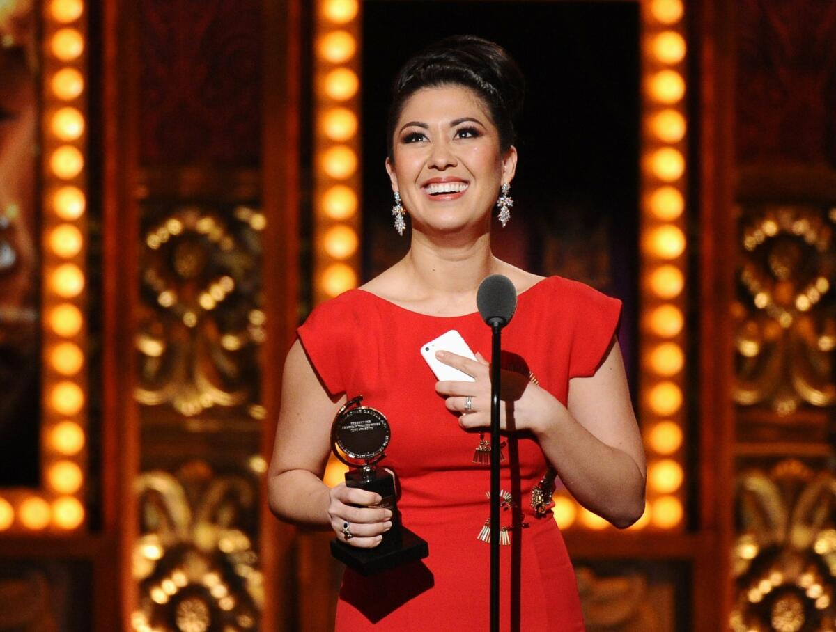 "The King & I" actress Ruthie Ann Miles accepts the award for actress in a featured role in a musical.