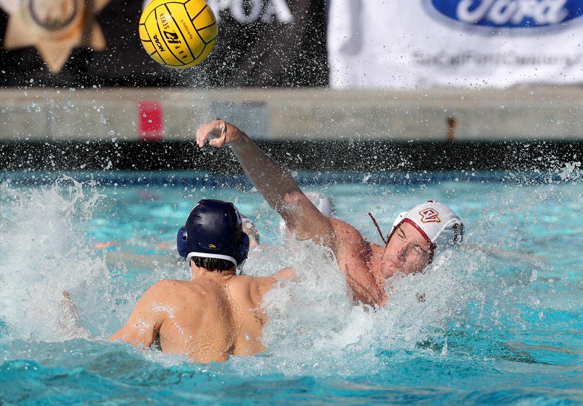 Ocean View's Kyle Ayers, right, shoots against Crean Lutheran during the second half of Saturday's CIF title match.