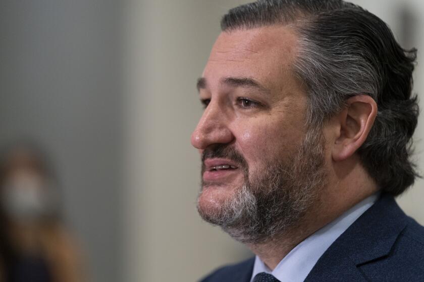 Sen. Ted Cruz, R-Texas, speaks with reporters on Capitol Hill in Washington, Saturday, Feb. 13, 2021, on the fifth day of the second impeachment trial of former President Donald Trump. (AP Photo/Alex Brandon)