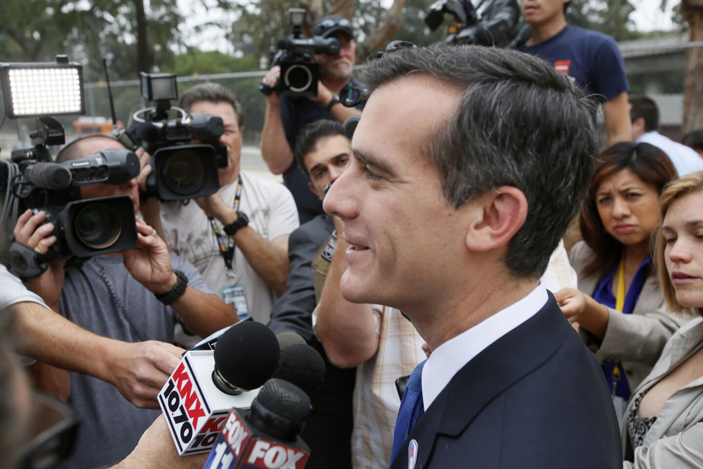 Eric Garcetti speaks to reporters after casting his ballot in Silver Lake.