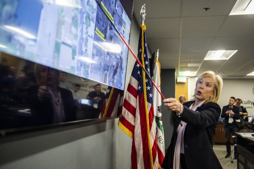 Sacramento County District Attorney Anne Marie Schubert points at a map of the scene of the Stephon Clark shooting at a press conference in Sacramento.