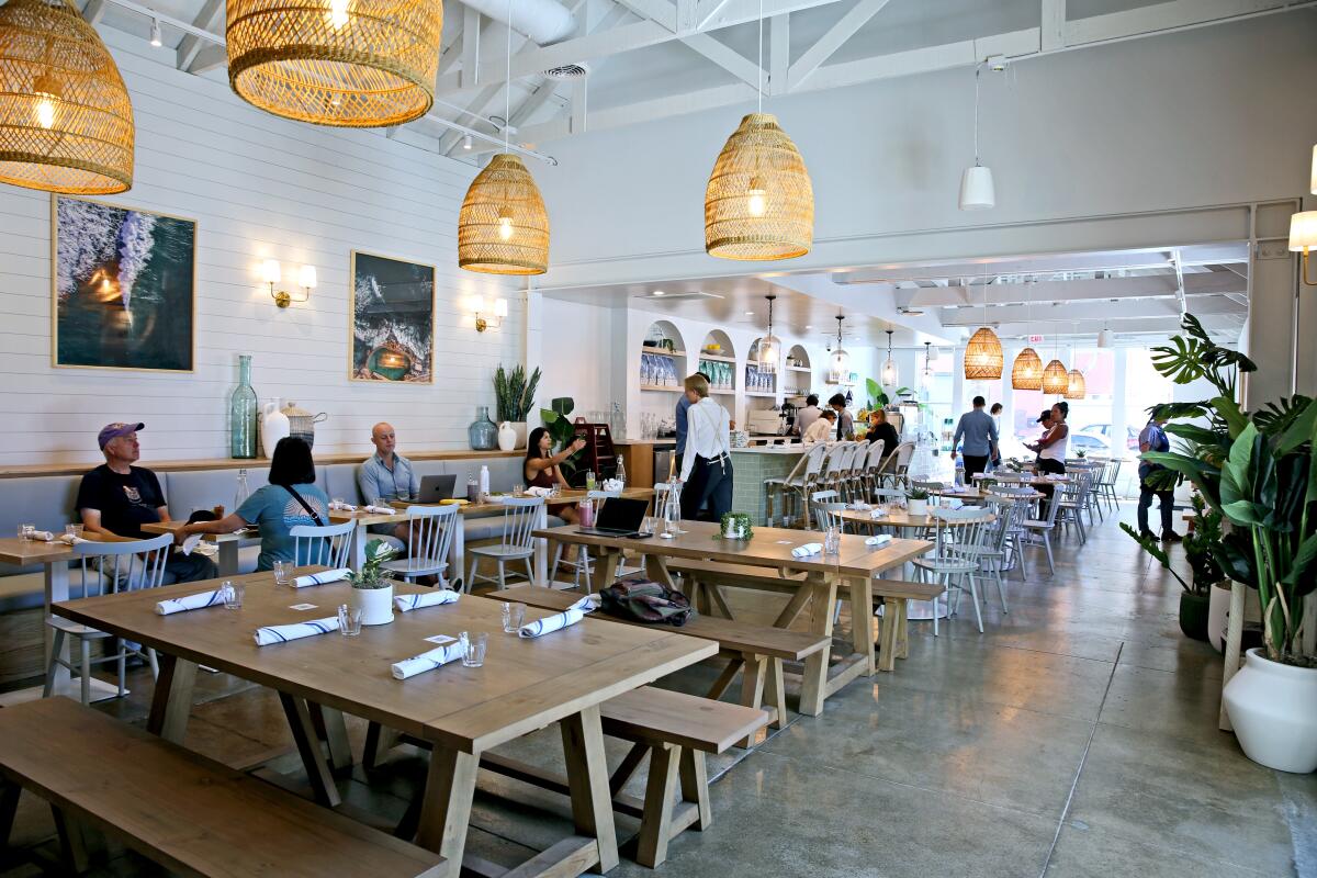 The interior of Bluestone Lane, an Australian coffee shop on Olive Street in the city of Orange.