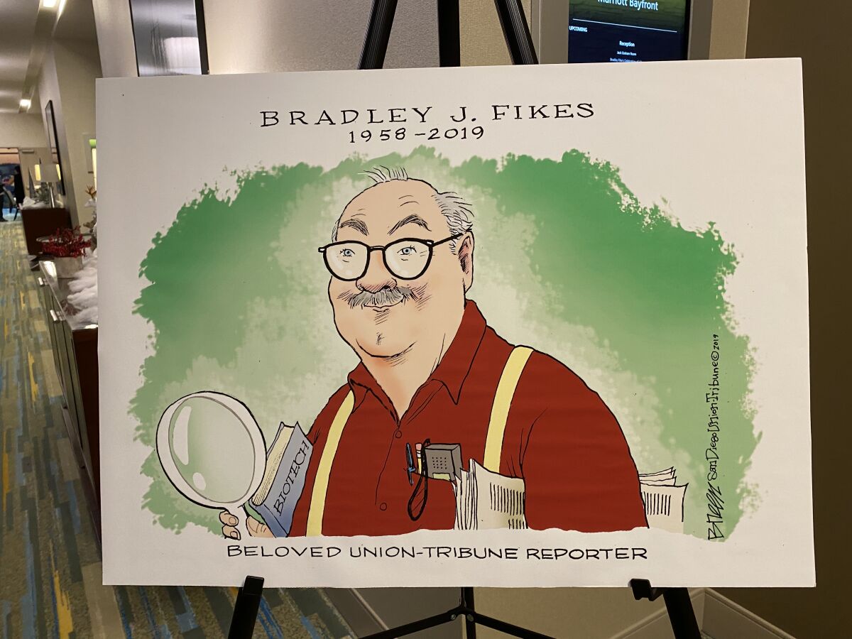This caricature of Fikes, by two-time Pulitzer Prize-winning editorial cartoonist Steve Breen, welcomes visitors to his U-T memorial service.