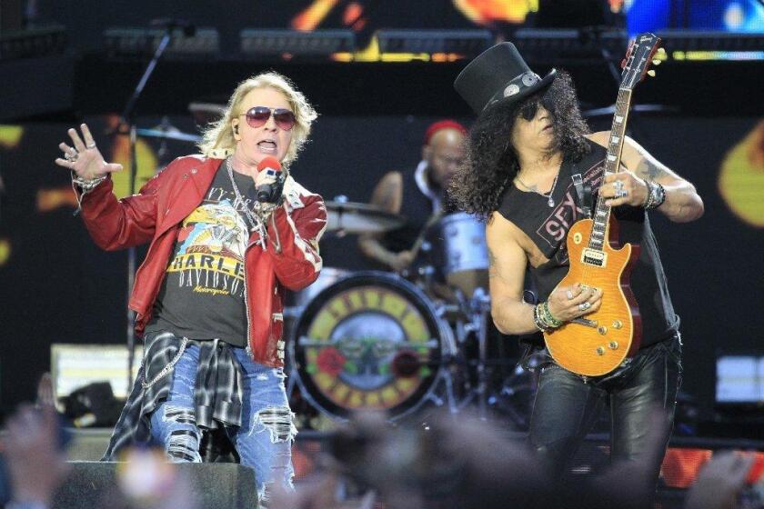 Guns N' Roses, including Axl Rose, left, and Slash, will get its own SiriusXM radio channel starting July 13.
