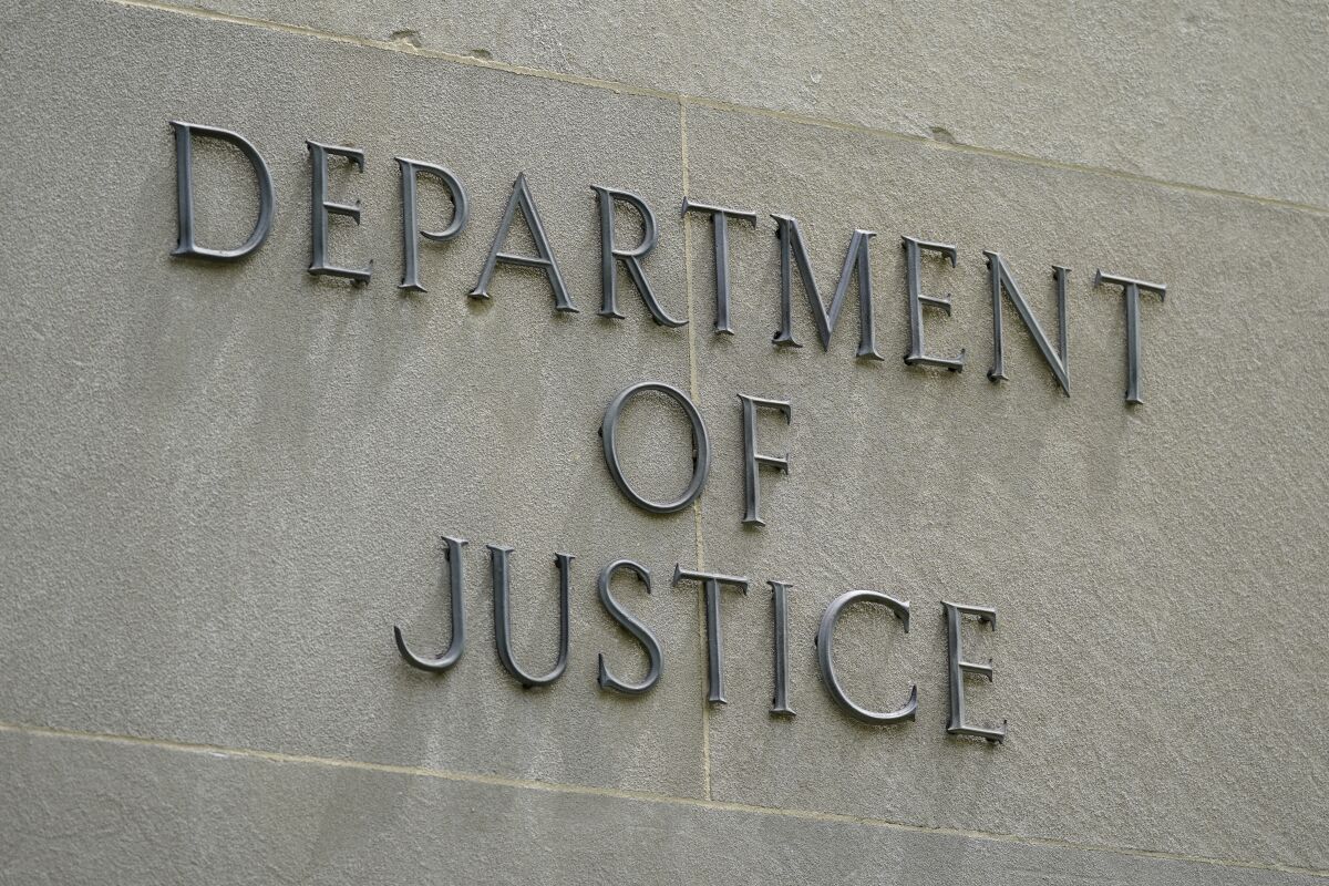 A sign outside the Robert F. Kennedy Department of Justice building in Washington. 