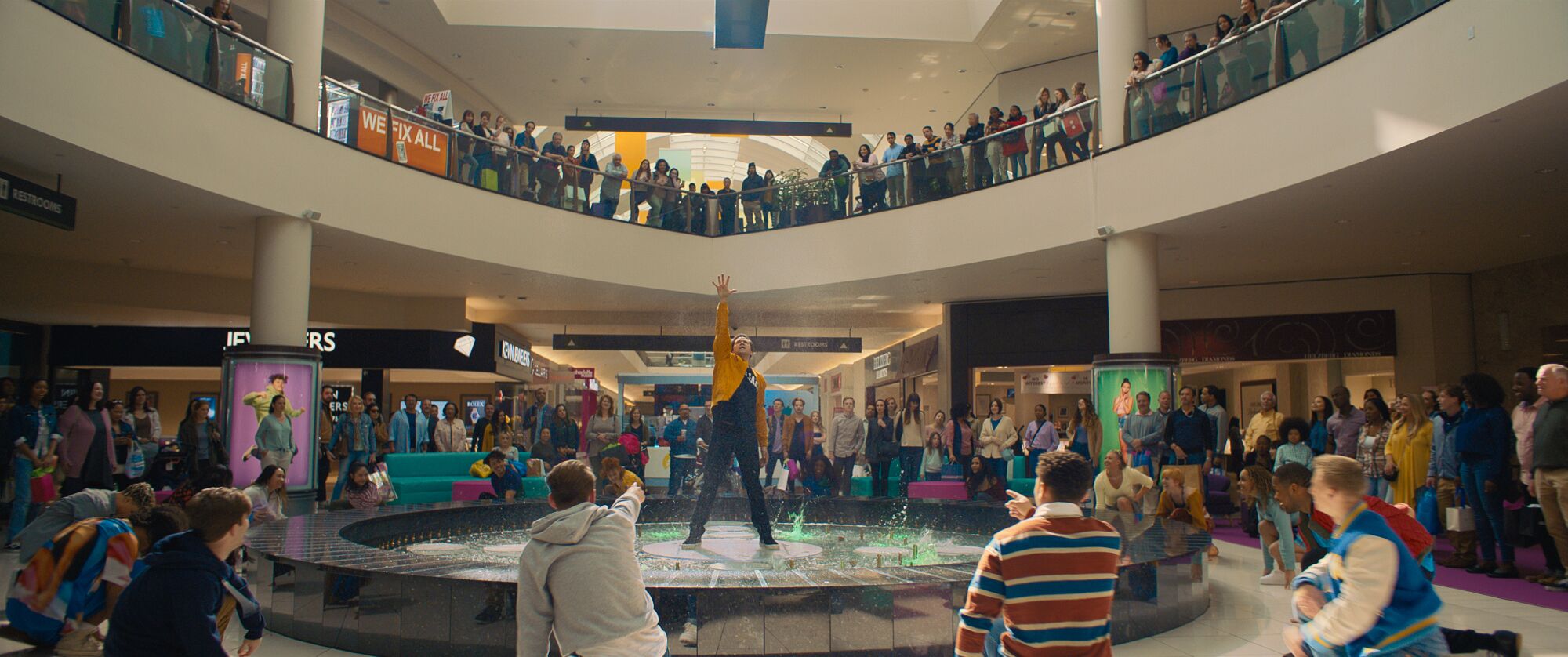 Andrew Rannells dances in the middle of a mall fountain while filming "The Prom."