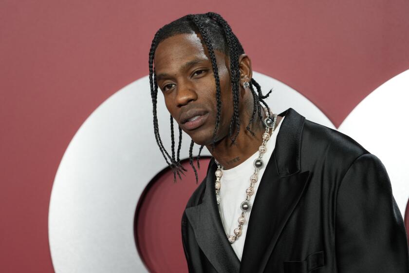 Travis Scott arrives at GQ's Men of the Year Party at Bar Marmont, Thursday, Nov. 16, 2023, in Los Angeles. (AP Photo/Chris Pizzello)