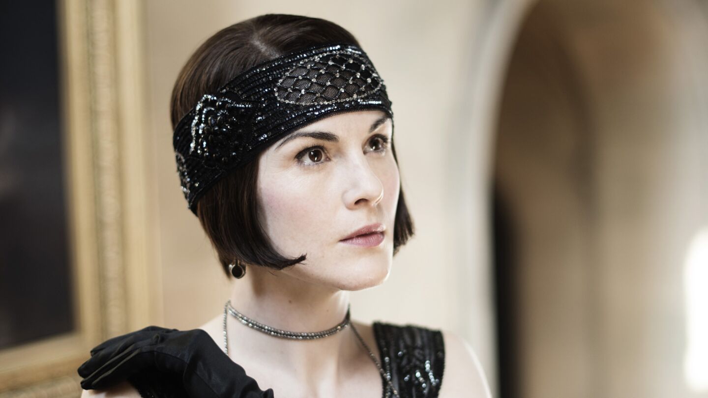 Michelle Dockery poses for portraits between filming a scene of "Downton Abbey" in the upstairs set at Highclere Castle.