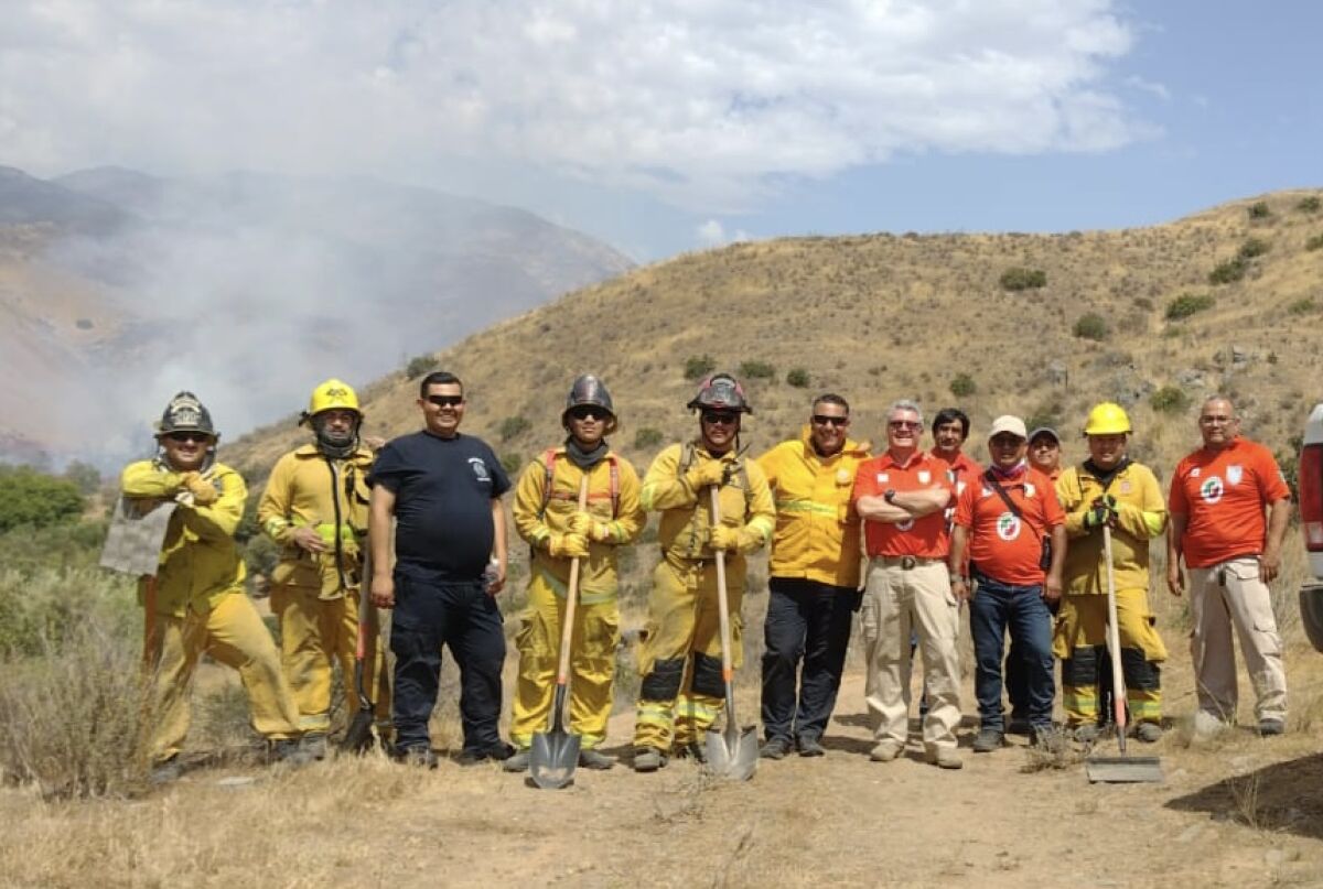 Firefighters from Mexico are photographed during a collaboration with Cal Fire fighting the Border 16 fire