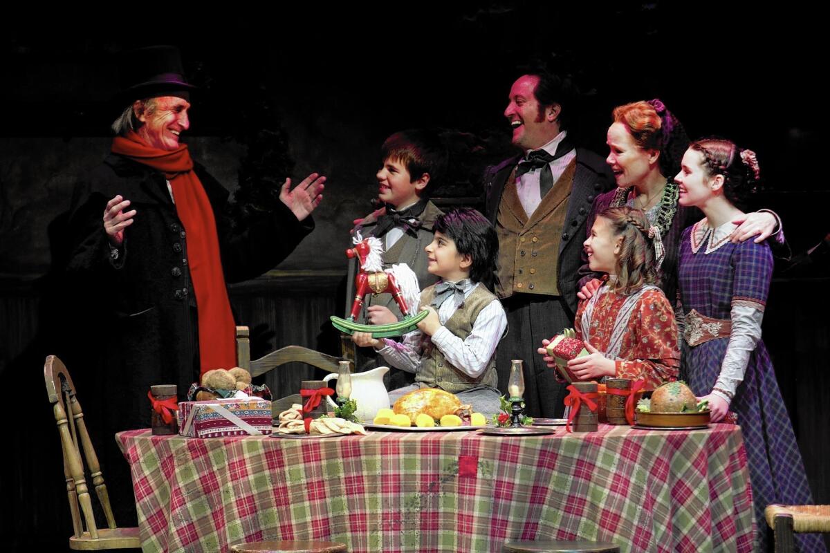 Hal Landon Jr., left, returns as Ebenezer Scrooge in South Coast Repertory's 36th annual production of "A Christmas Carol," which runs through Dec. 27.