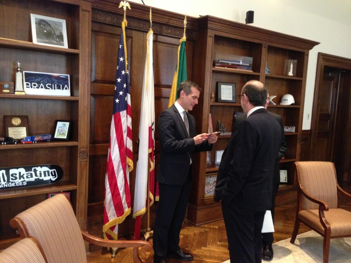 Los Angeles Mayor Eric Garcetti meets in his City Hall office with Mexico City officials.